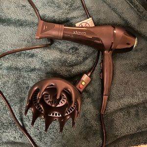 Xtava blow dryer with orchid diffuser attachment. Salon quality.